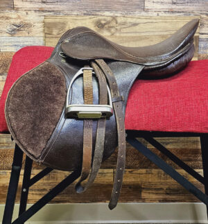 used granada all purpose saddle facing left