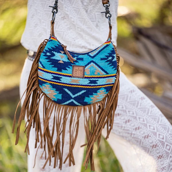 Woman carrying the STS Mojave Sky Nellie Fringe Bag
